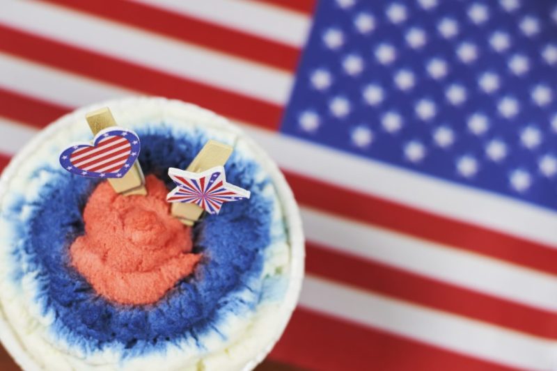 US flag under an ice cream decorated in the colors of the flag